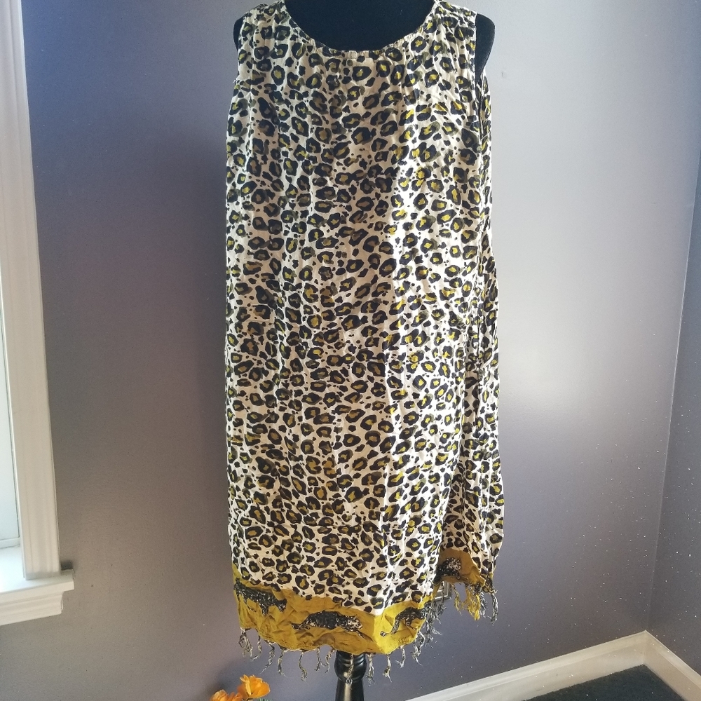 Westside, gently used dress with fringe on bottom